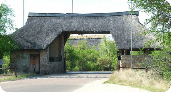 Traditional thatched entrance gate at Kruger National Park in South Africa.