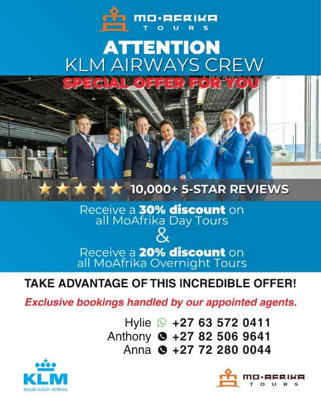 KLM Airways crew in uniform at Moafrika Tours promotional event.