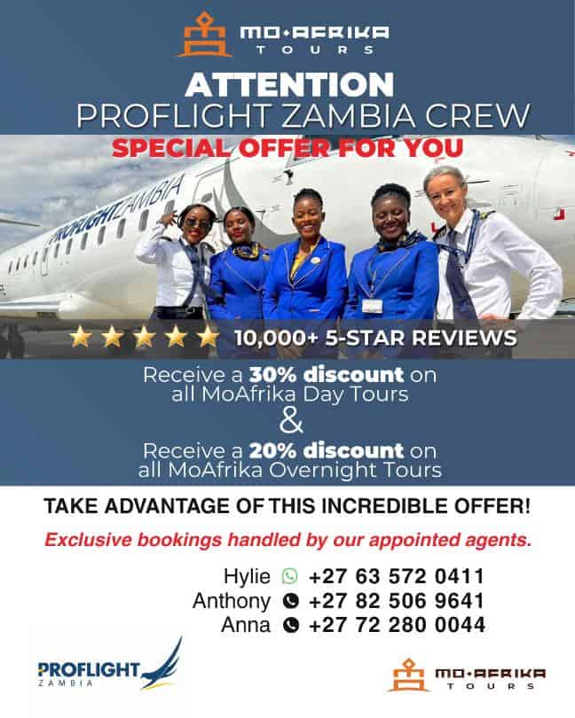 Proflight Zambia crew in uniform with airplane in background.