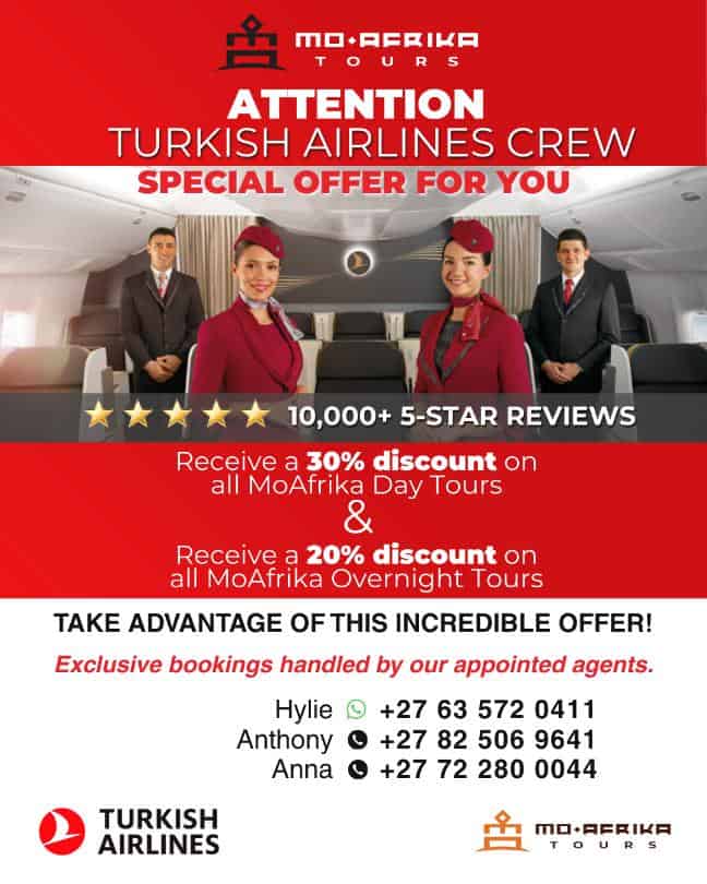 Turkish Airlines cabin crew smiling in aircraft interior for special offer.