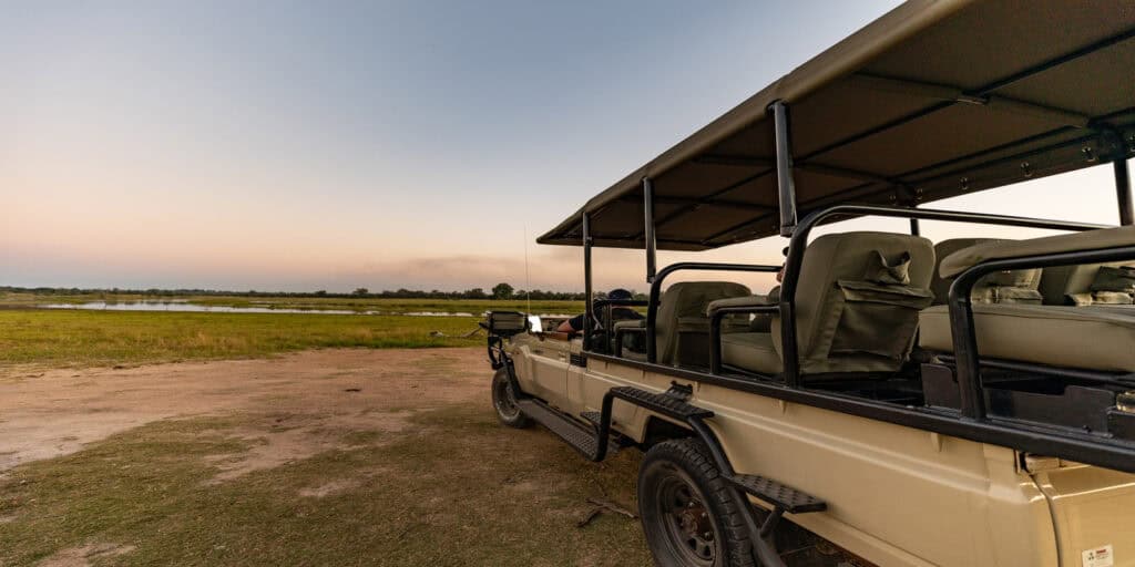 Open safari vehicle at Ndzhaka Tented Camp during sunset.